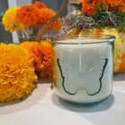 Honey candle in clear glass with embossed butterfly
